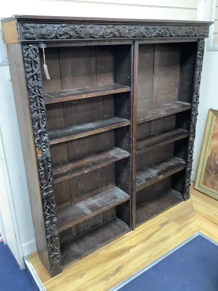 A 19th century Flemish carved oak open bookcase (adapted), length 150cm, depth 28cm, height 152cm